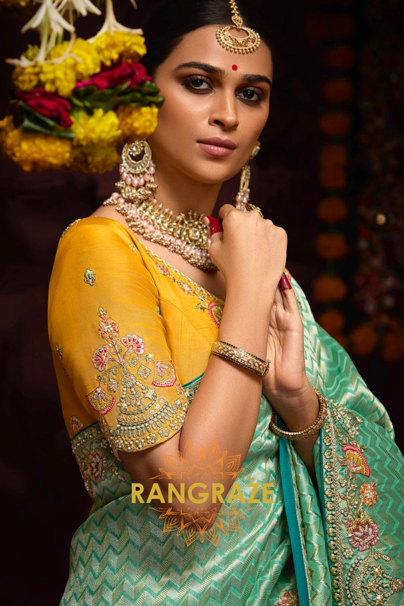 Golden Glow and Sea Green Banarasi Kanjivaram Saree – A Radiant Blend of Tradition and Opulence