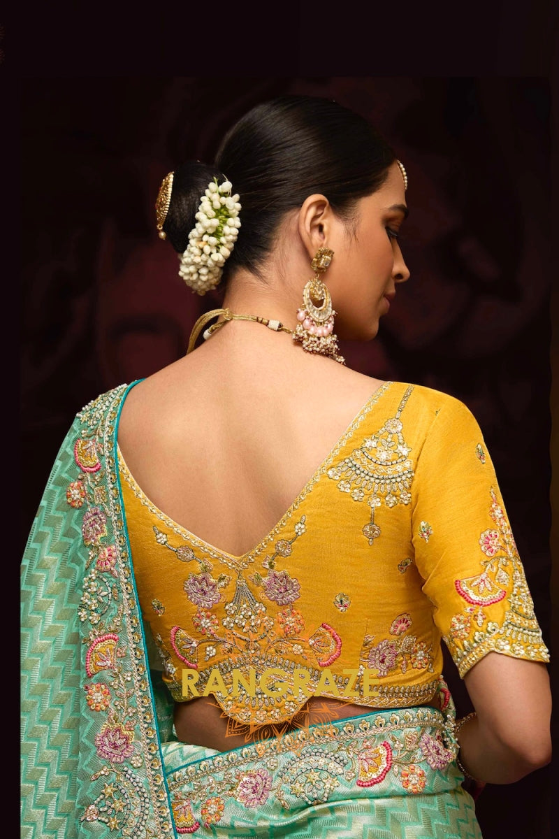 Golden Glow and Sea Green Banarasi Kanjivaram Saree – A Radiant Blend of Tradition and Opulence