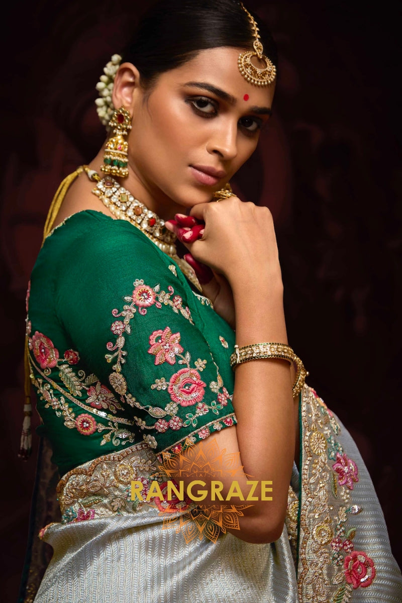 Ice Blue and Emerald Green Banarasi Silk Saree – A Symphony of Grace and Royalty