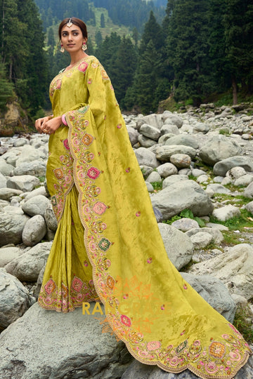 Golden Majesty: Designer Embroidered Woven Silk Saree