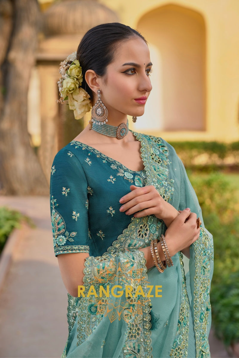 Ocean Breeze: Embroidered Seafoam Green Organza Saree with Cut Work and Teal Silk Blouse