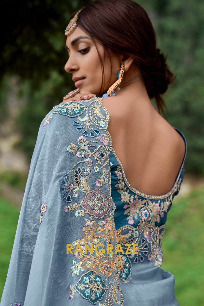 Maya Blue: Designer Embroidered Organza Saree with Silk Blouse