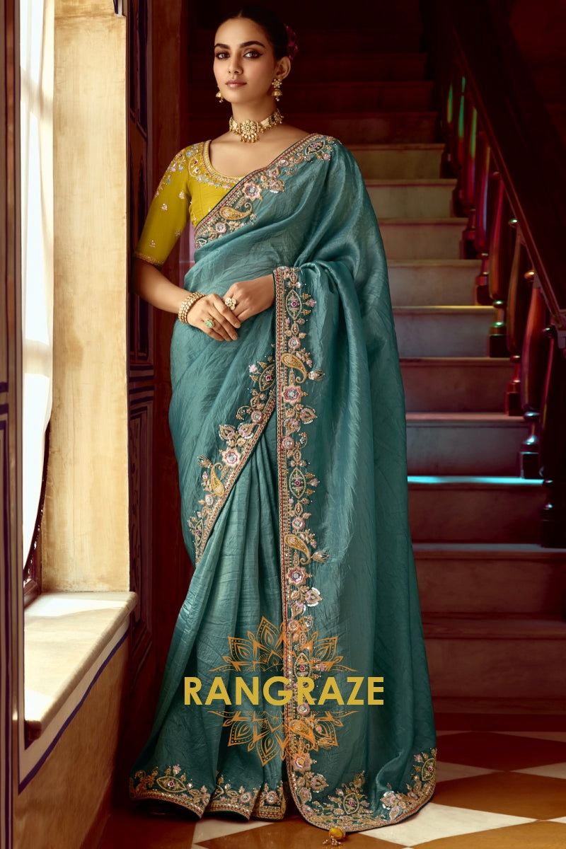 Mystic Teal Saree – A Symphony of Elegance