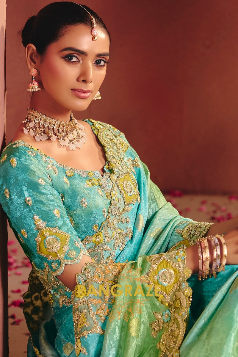 Zari Dola Jacquard Saree with Heavy Embroidery & Designer Blouse