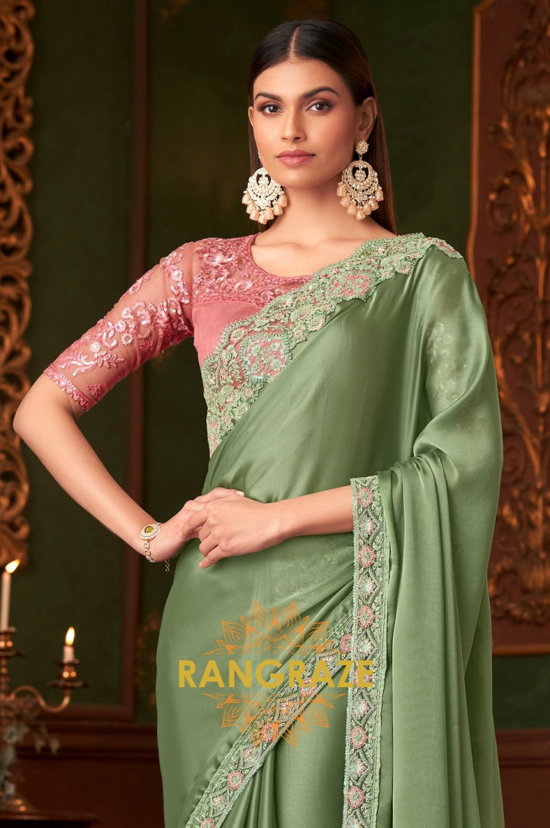 Graceful Green Designer Saree with Peach Pink Blouse