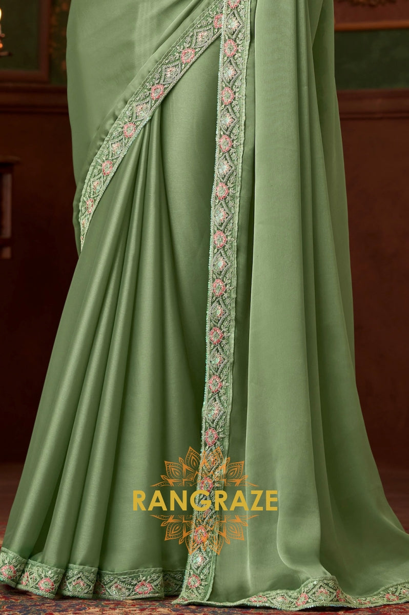 Graceful Green Designer Saree with Peach Pink Blouse