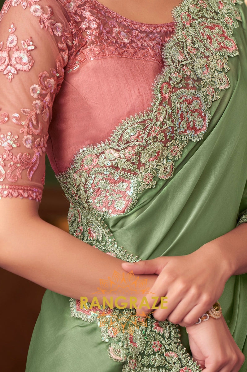 Graceful Green Designer Saree with Peach Pink Blouse