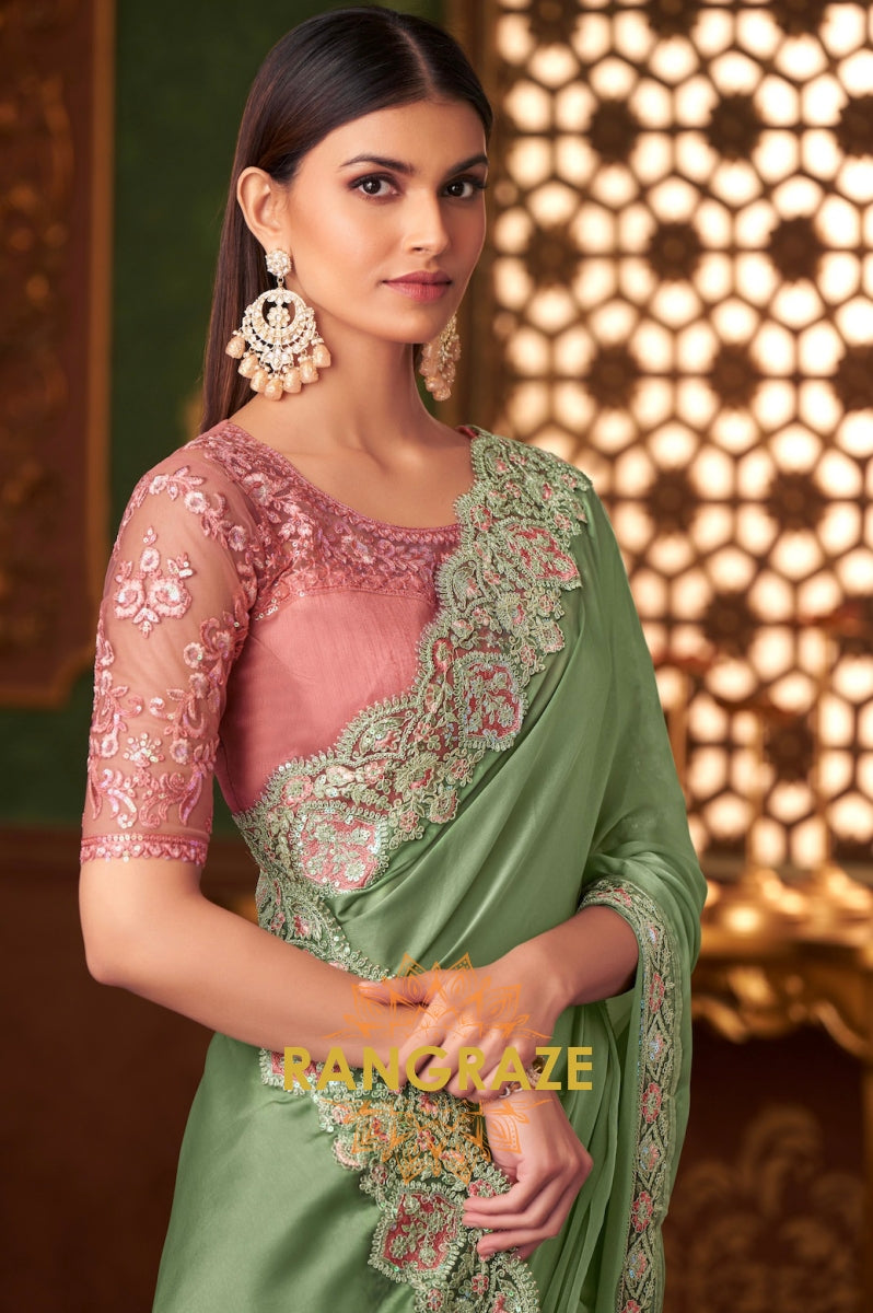 Graceful Green Designer Saree with Peach Pink Blouse