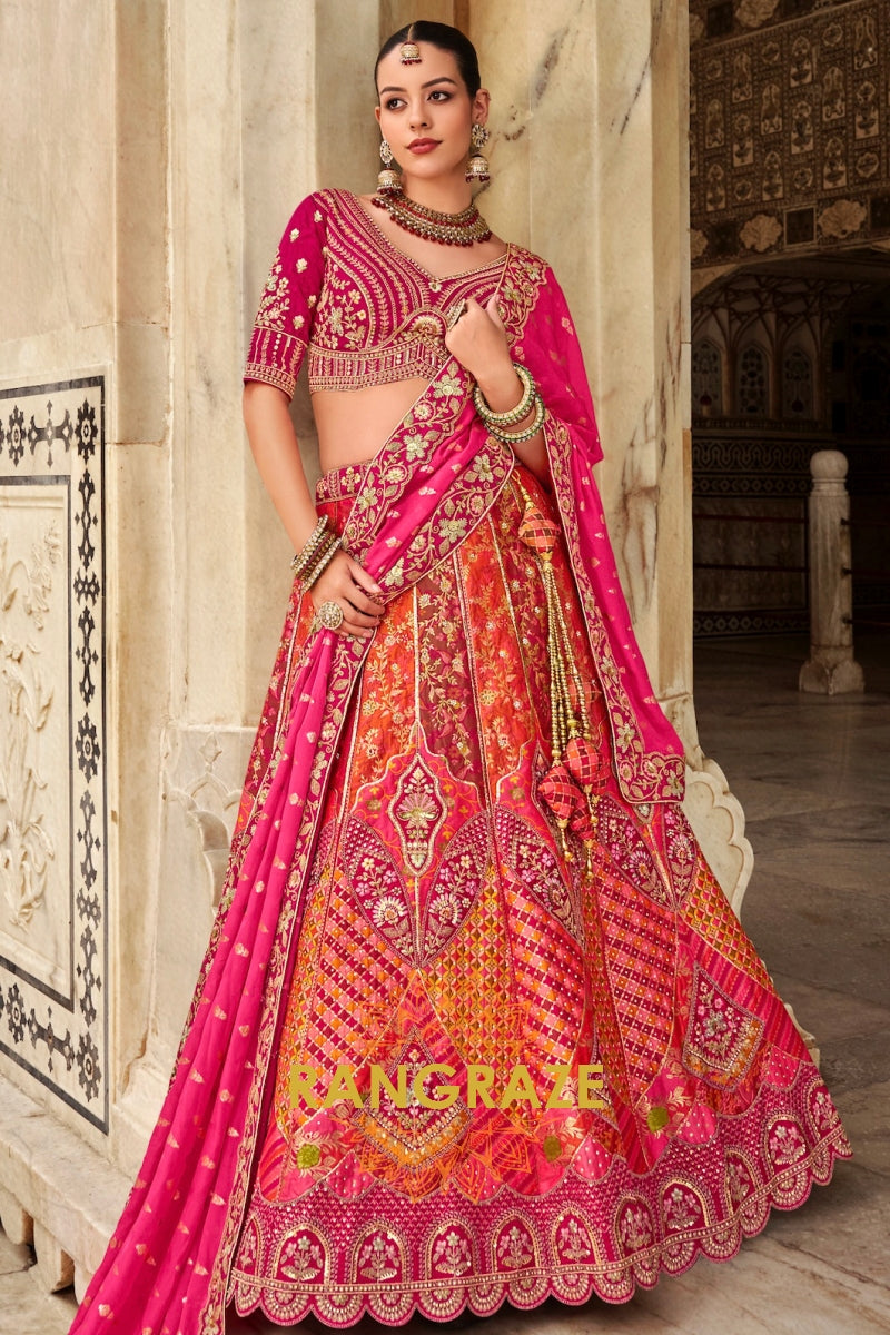 Fuchsia Pink and Fiery Orange Banarasi Embroidered Lehenga – A Symphony of Traditional Grandeur