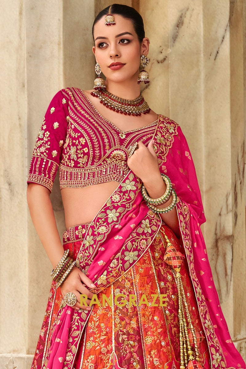Fuchsia Pink and Fiery Orange Banarasi Embroidered Lehenga – A Symphony of Traditional Grandeur