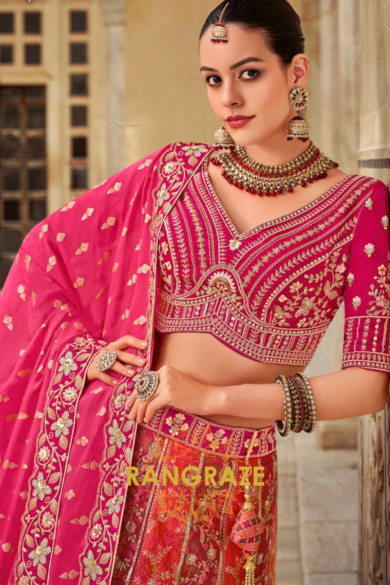 Fuchsia Pink and Fiery Orange Banarasi Embroidered Lehenga – A Symphony of Traditional Grandeur