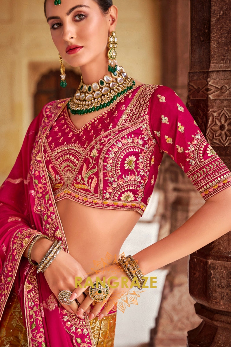 Radiant Ruby Pink and Mustard Banarasi Silk Lehenga – A Statement of Regal Sophistication