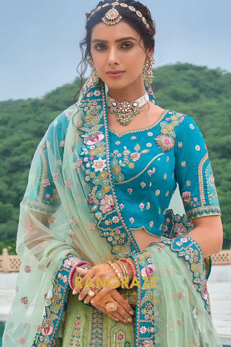 Teal Blue and Pistachio Green Embroidered Lehenga – A Vision of Refined Opulence