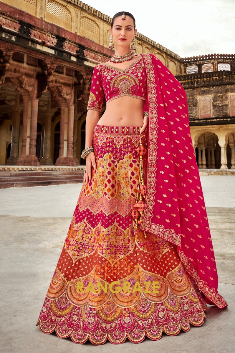 Radiant Fuchsia and Orange Embroidered Silk Lehenga – A Blend of Vibrance and Tradition