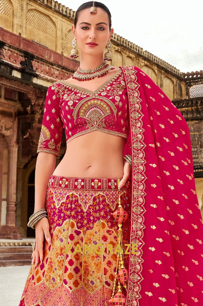 Radiant Fuchsia and Orange Embroidered Silk Lehenga – A Blend of Vibrance and Tradition