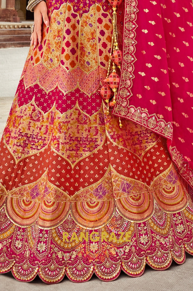 Radiant Fuchsia and Orange Embroidered Silk Lehenga – A Blend of Vibrance and Tradition
