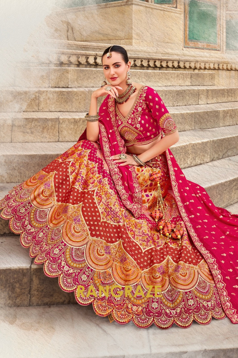 Radiant Fuchsia and Orange Embroidered Silk Lehenga – A Blend of Vibrance and Tradition
