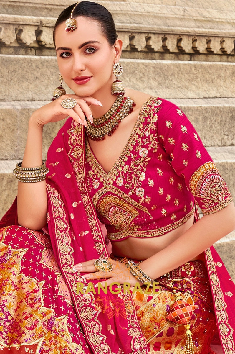 Radiant Fuchsia and Orange Embroidered Silk Lehenga – A Blend of Vibrance and Tradition