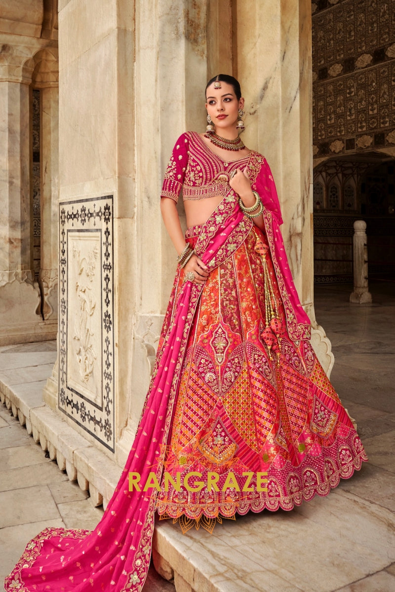 Fuchsia Pink and Fiery Orange Banarasi Embroidered Lehenga – A Symphony of Traditional Grandeur