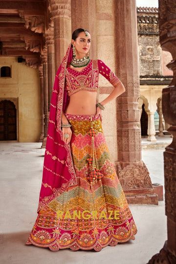 Radiant Ruby Pink and Mustard Banarasi Silk Lehenga – A Statement of Regal Sophistication