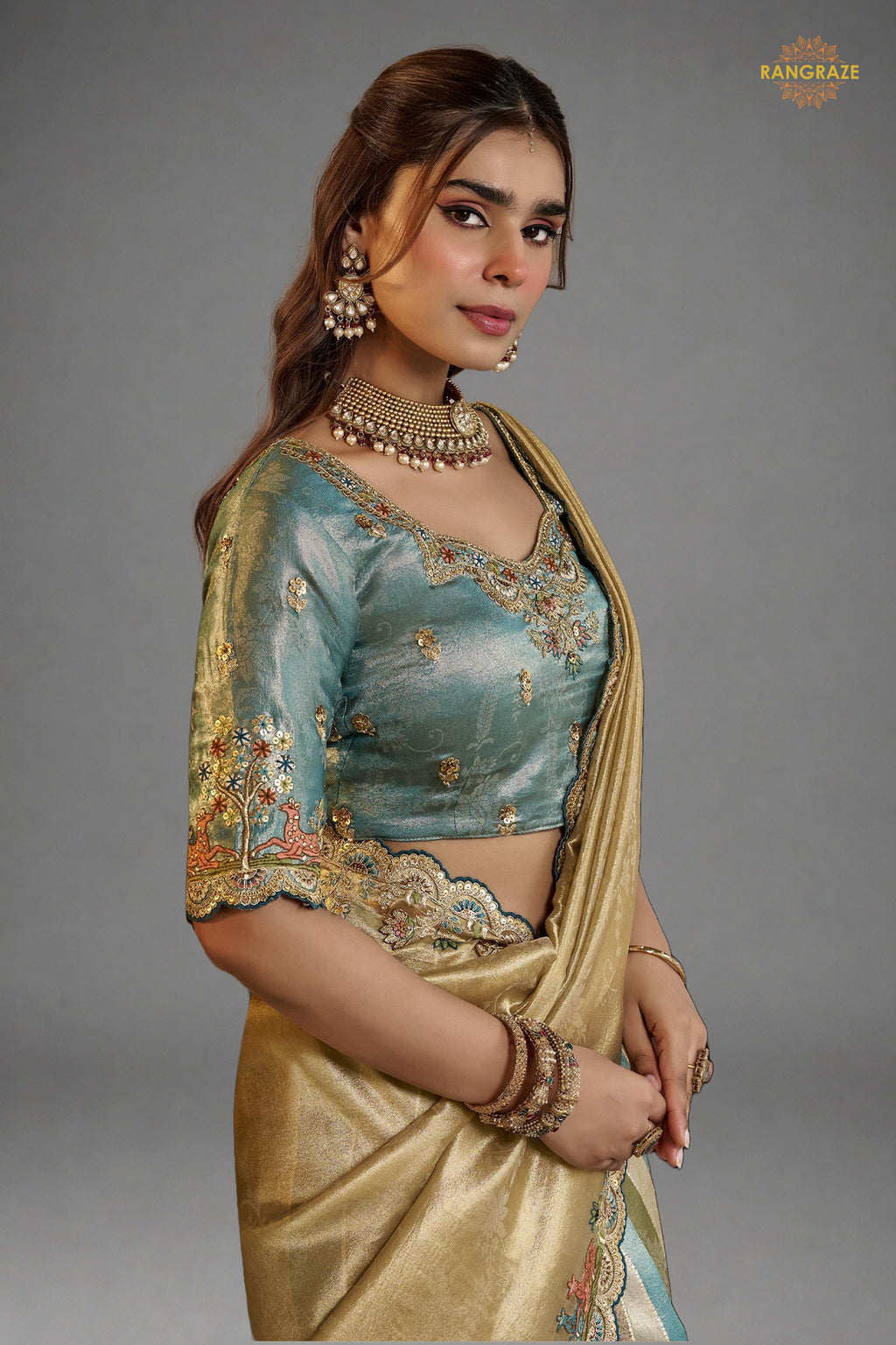 Golden And Blue Embroidred Fancy Silk Saree