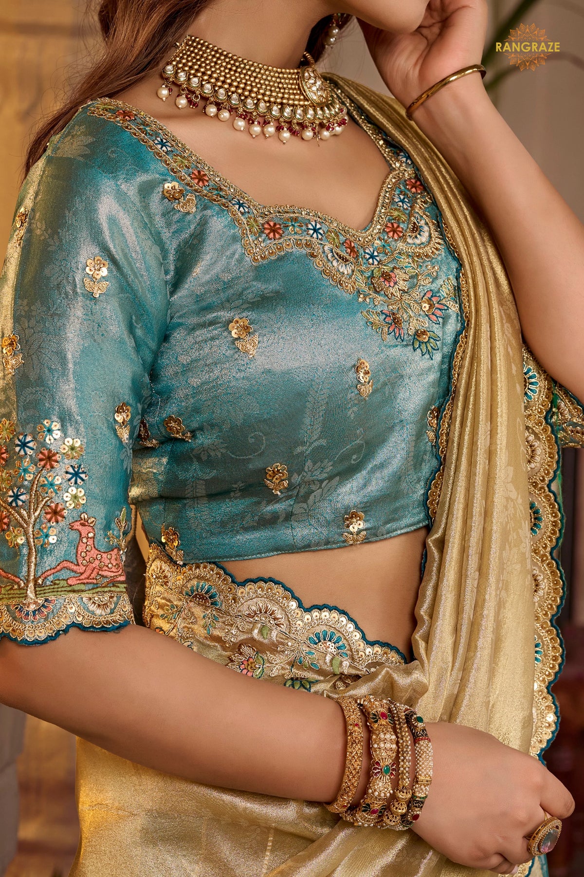 Golden And Blue Embroidred Fancy Silk Saree