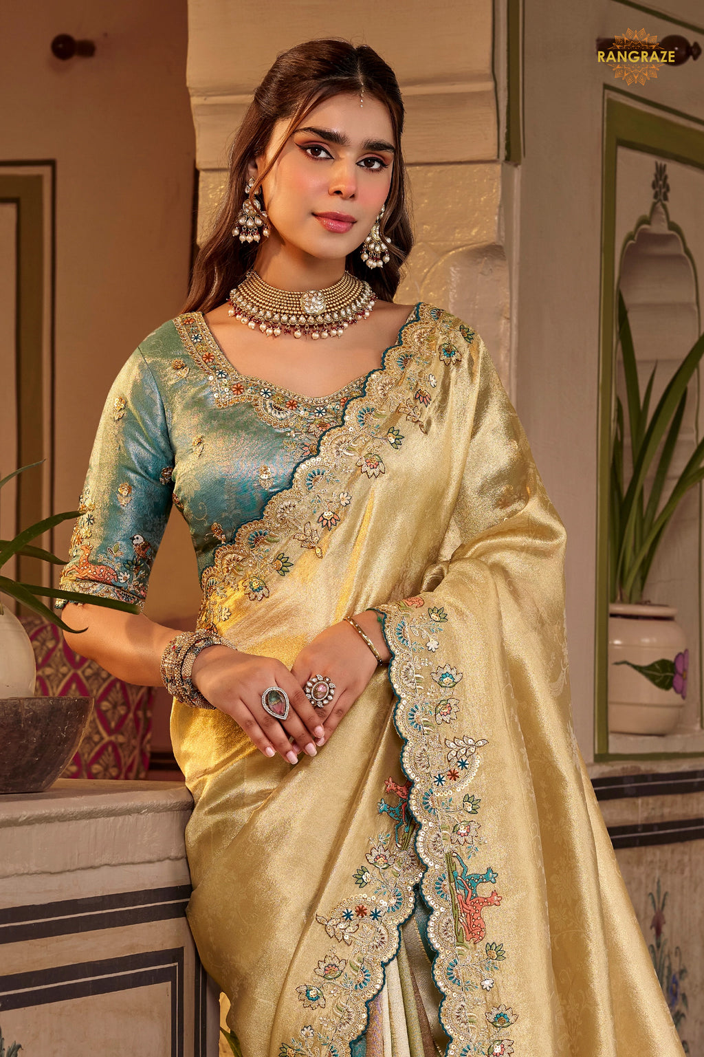 Golden And Blue Embroidred Fancy Silk Saree