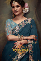 Teal Royale: Handwoven Tissue Embroidered Saree