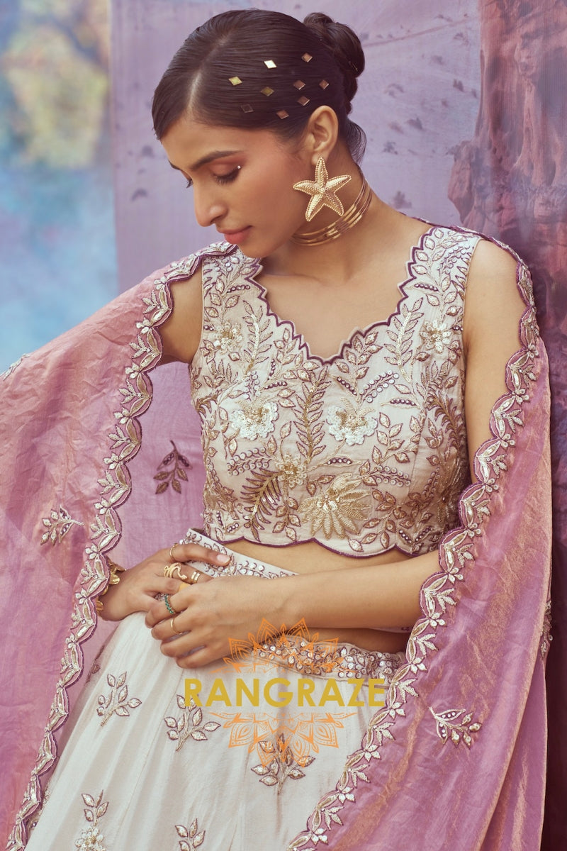 Elegant Cream and Purple Viscose Semi-Stitched Lehenga Choli with Sequins and Embroidery Detailing