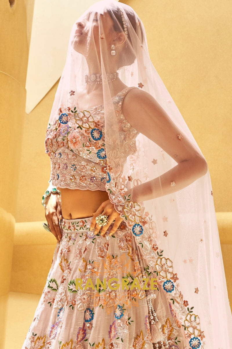 Elegant Rose Gold Organza Semi-Stitched Lehenga Choli with Intricate Sequins and Embroidery Detailing