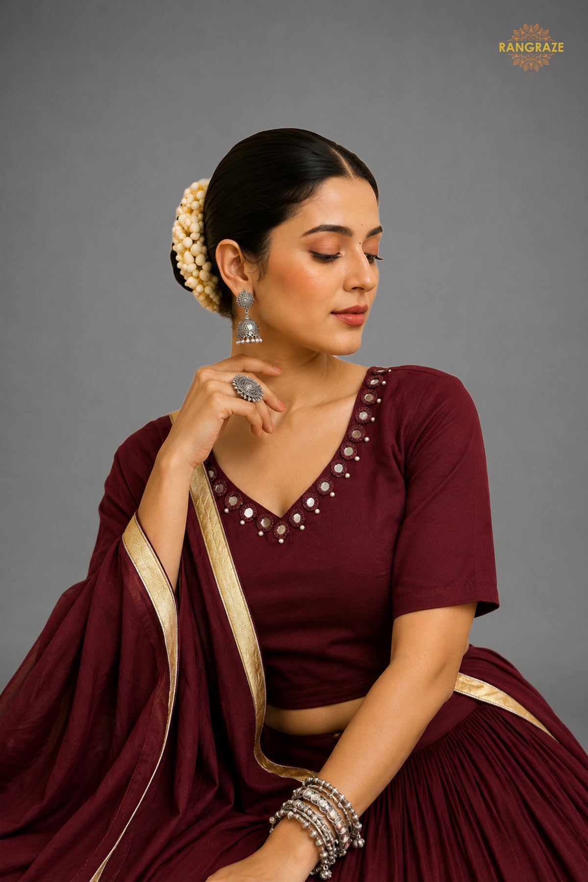 Maroon Tiered Flared Lehenga Choli with Real Mirror Work Neckline