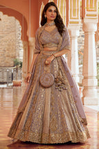 Mauve Heavy Work Banarasi Silk Lehenga With Clutch