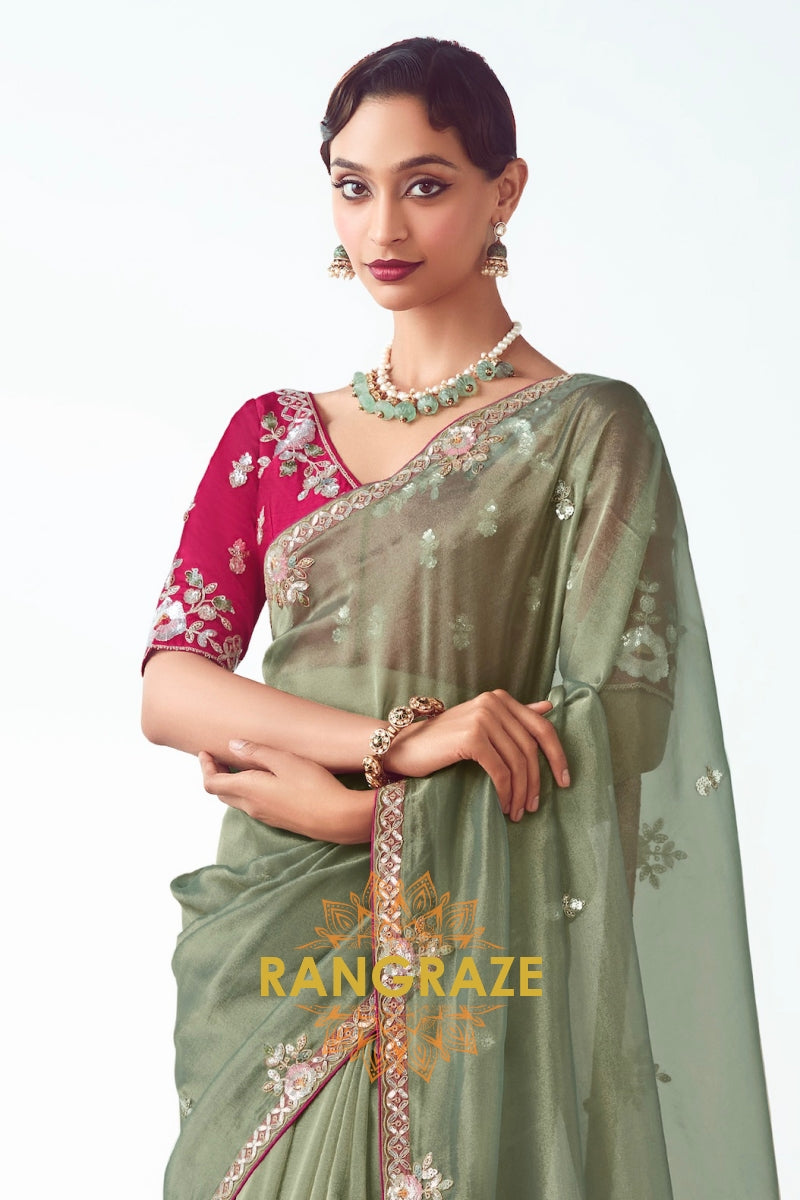 Olive Opulence Organza Saree with Rani Pink Embroidered Blouse