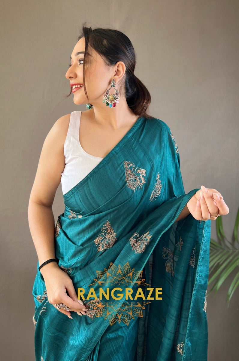 Turquoise Silk Saree With Zari-Based Embroidery And Piping