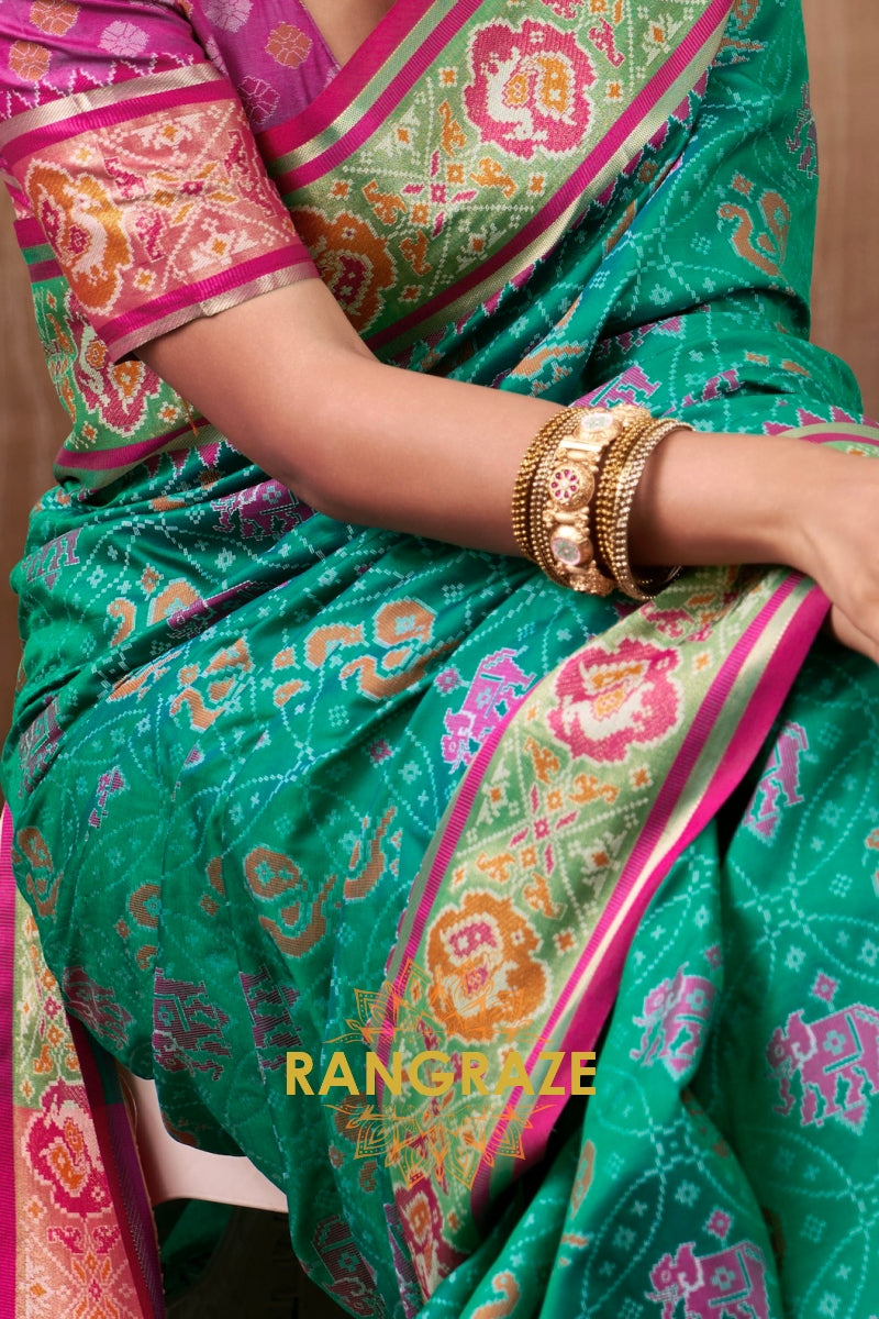 Emerald Bloom & Fuchsia Patola Silk Saree