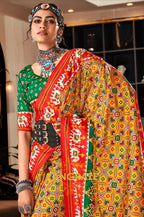 Vibrant Yellow and Green Patola Print Tusser Silk Saree