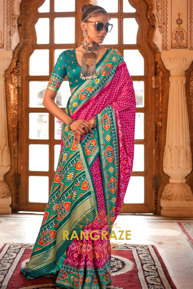 Vibrant Fuchsia and Teal Green Patola Silk Saree with Contrasting Border