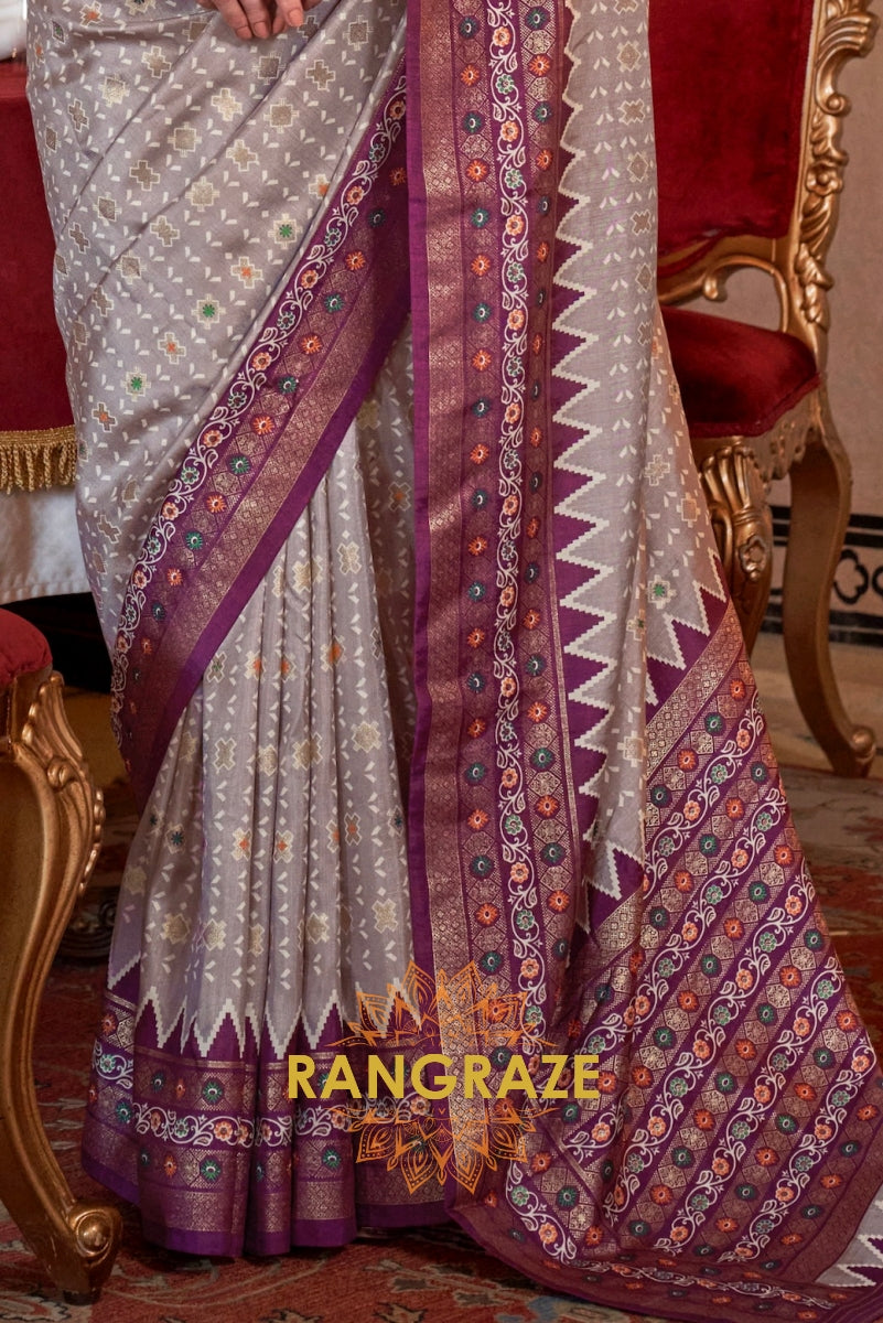 Regal Lavender Patola Silk Saree with Plum Weaving Border