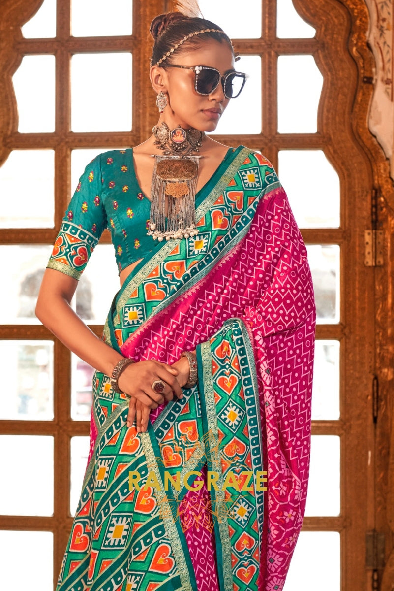 Vibrant Fuchsia and Teal Green Patola Silk Saree with Contrasting Border