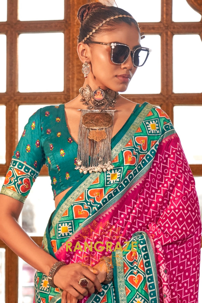 Vibrant Fuchsia and Teal Green Patola Silk Saree with Contrasting Border