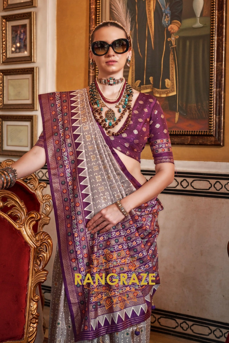 Regal Lavender Patola Silk Saree with Plum Weaving Border