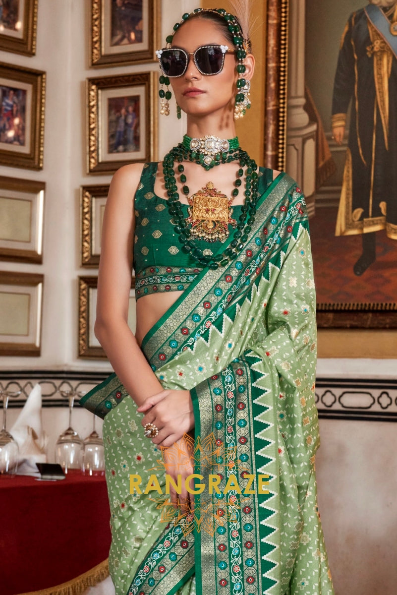 Celestial Sage Patola Silk Saree with Emerald Weaving Border