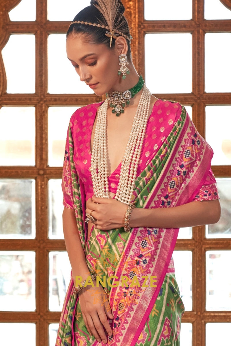 Bright Olive and Fuchsia Patola Silk Saree with Ornate Border