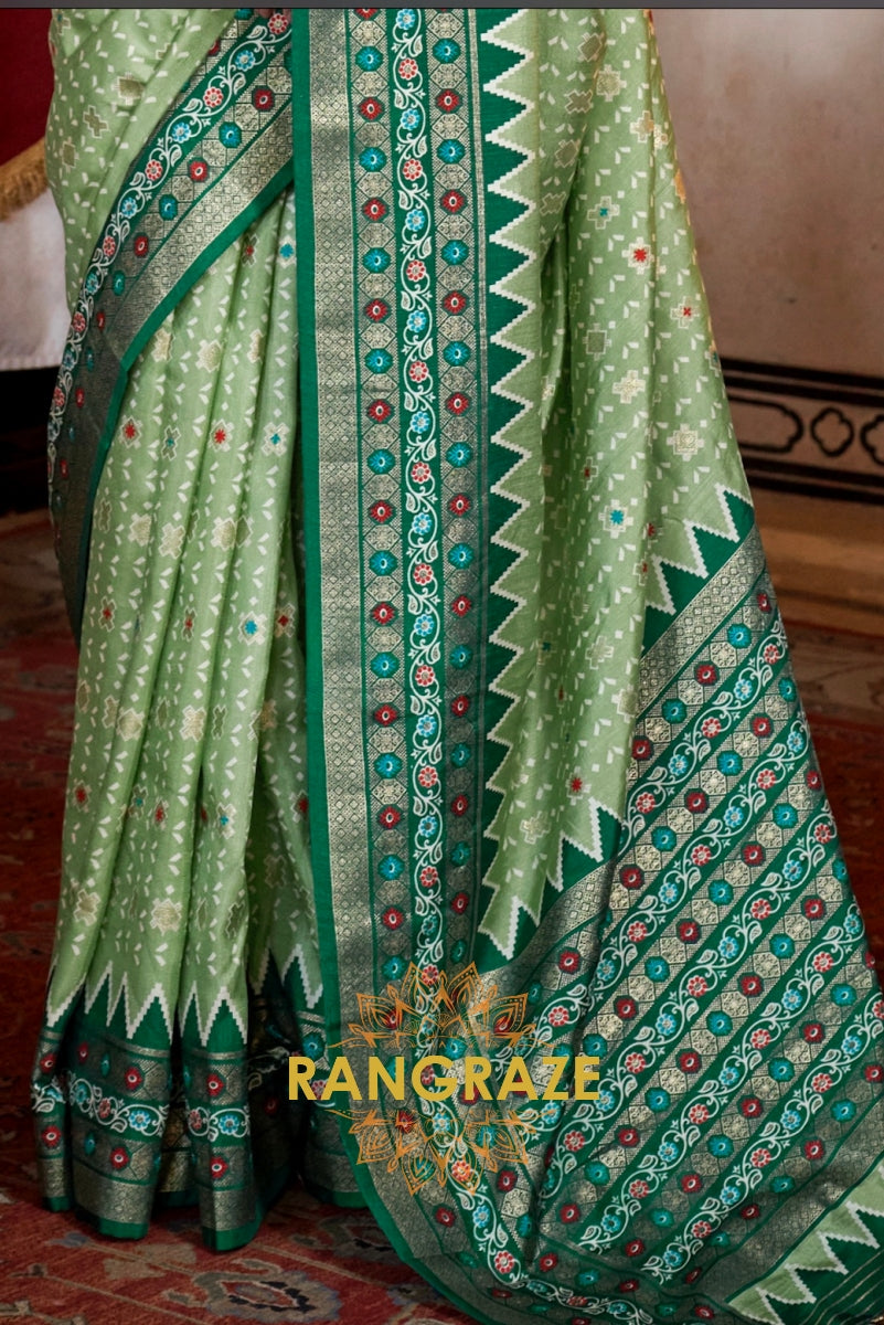 Celestial Sage Patola Silk Saree with Emerald Weaving Border