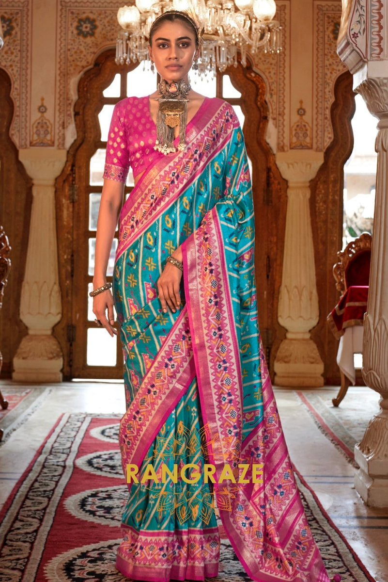 Turquoise and Fuchsia Patola Silk Saree with Floral Border