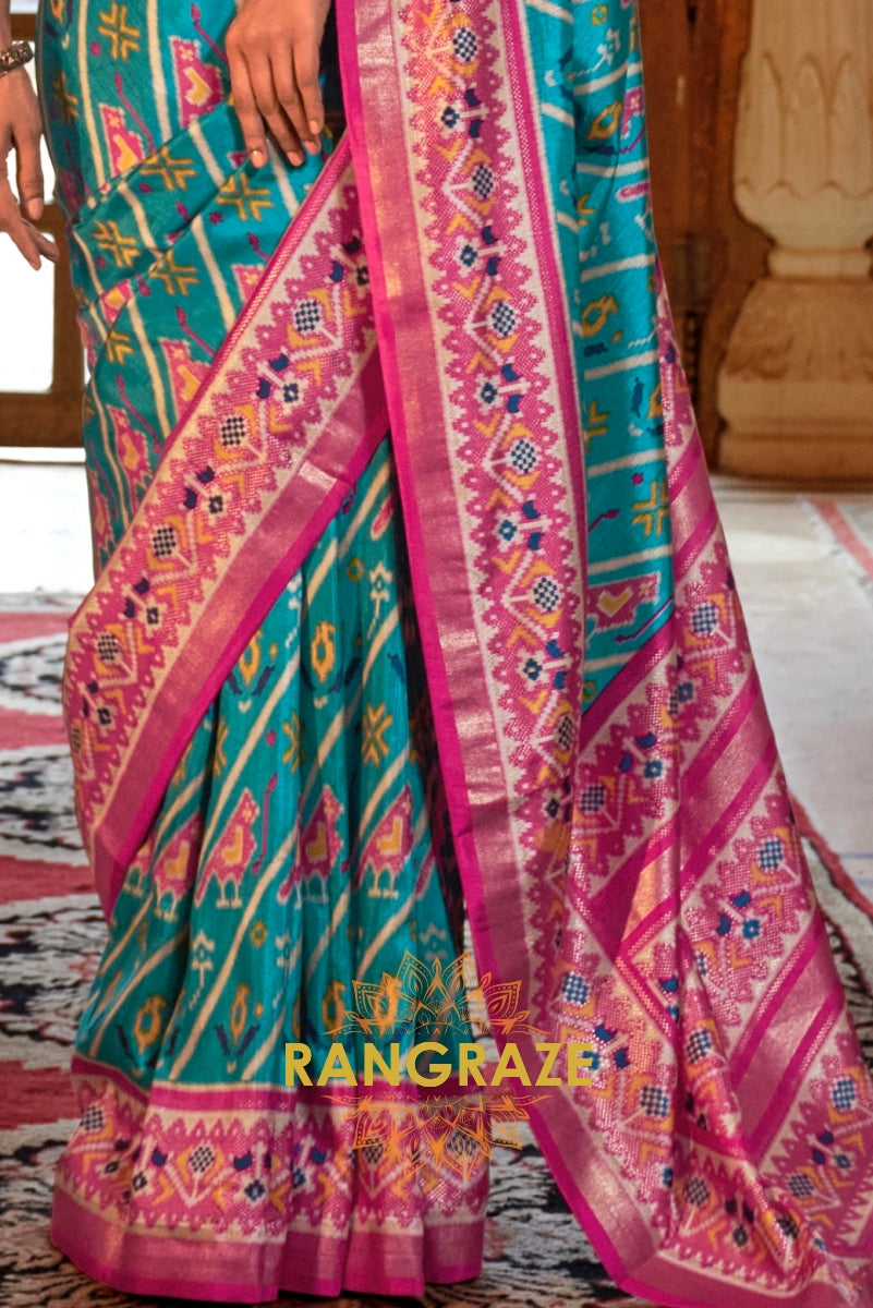 Turquoise and Fuchsia Patola Silk Saree with Floral Border