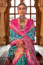 Turquoise and Fuchsia Patola Silk Saree with Floral Border