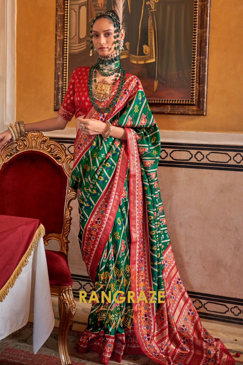 Majestic Emerald and Red Patola Silk Saree with Ornate Border