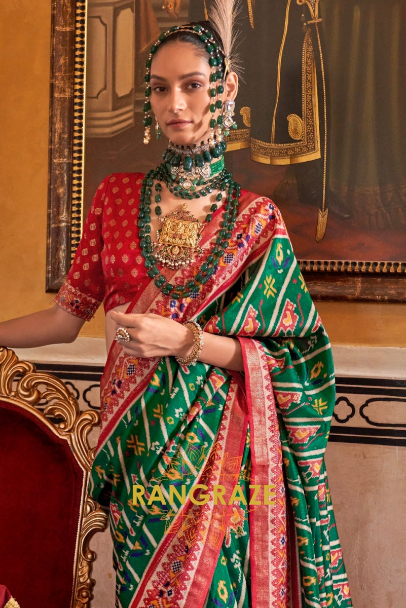 Majestic Emerald and Red Patola Silk Saree with Ornate Border