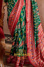 Majestic Emerald and Red Patola Silk Saree with Ornate Border